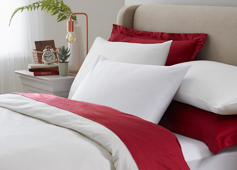 Bedroom styled shot of the Cotton Traders Cotton Sateen Duvet Set