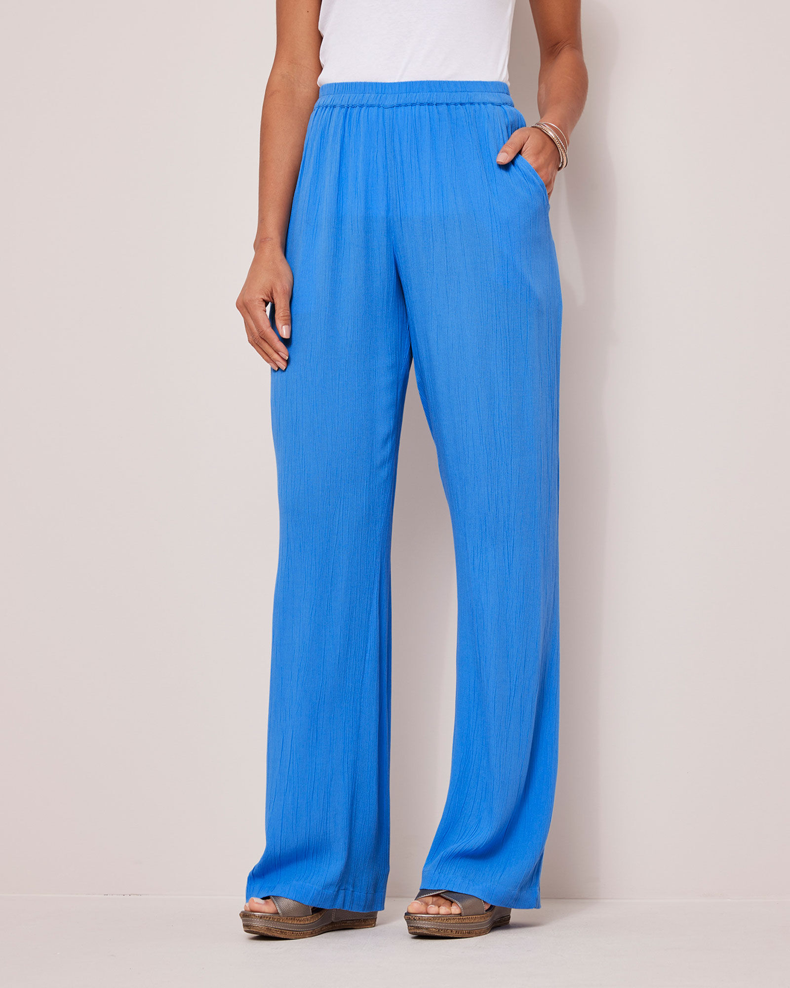Navy crinkle on sale trousers